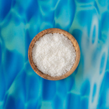 Mint Mojito Sugar in bowl on background of pool waves