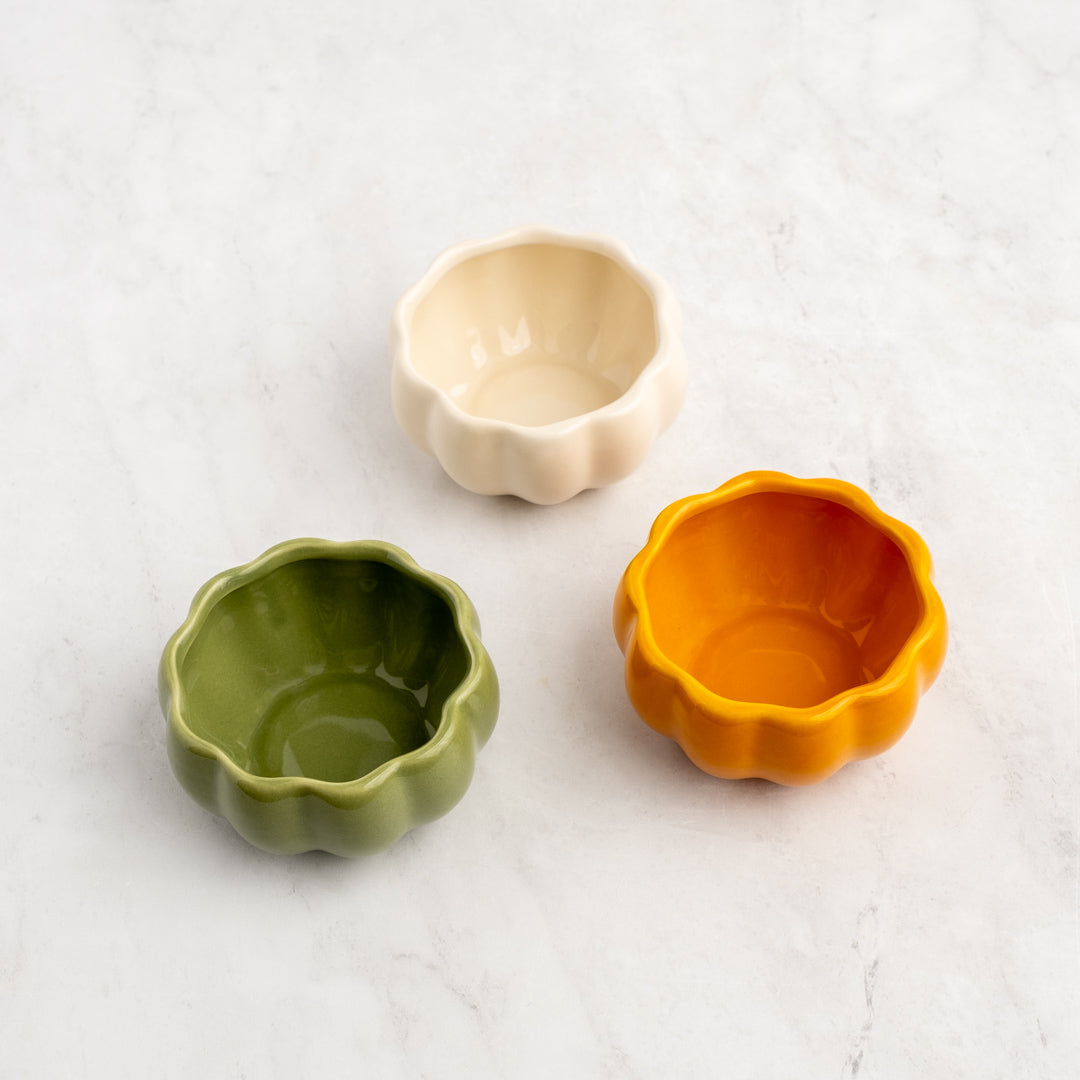 White, orange, and green pumpkin bowls.