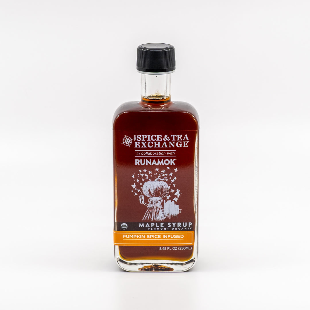 Bottle of Spice & Tea Exchange maple syrup with Runamok branding on a white background