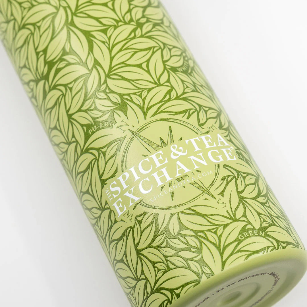 The Tea Leaf Travel Infuser Tumbler is a green stainless steel tumbler featuring a patterned design.