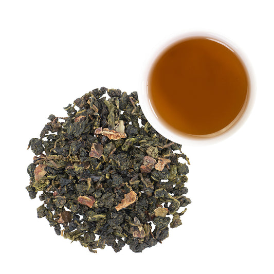 Vanilla Bean Oolong Tea in pile and brewed in mug