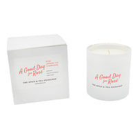 Candle and packaging labeled 'A Good Day for Rosé' by The Spice & Tea Exchange on a white background