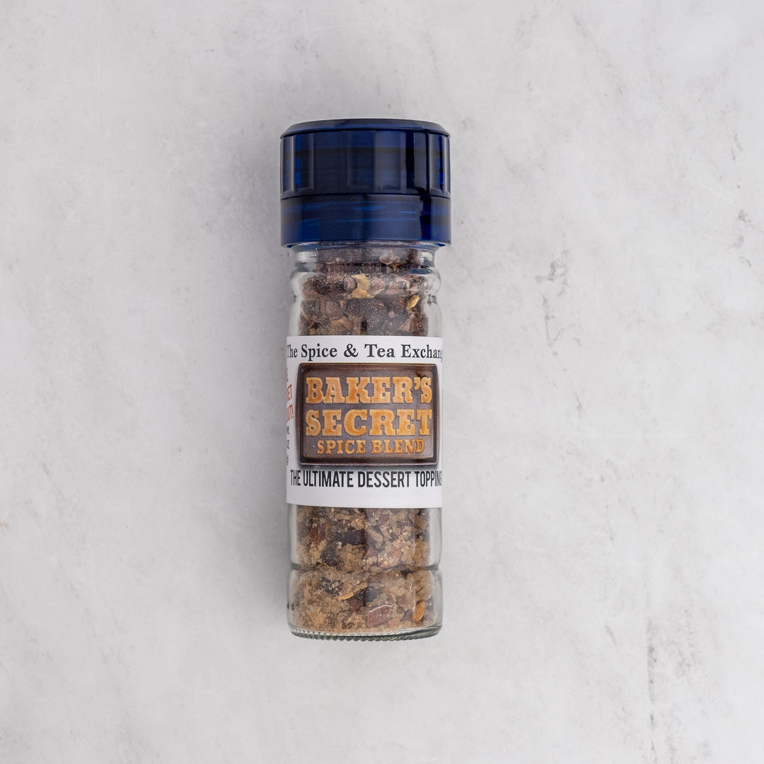 Baker's Secret spice blend container on a light gray background