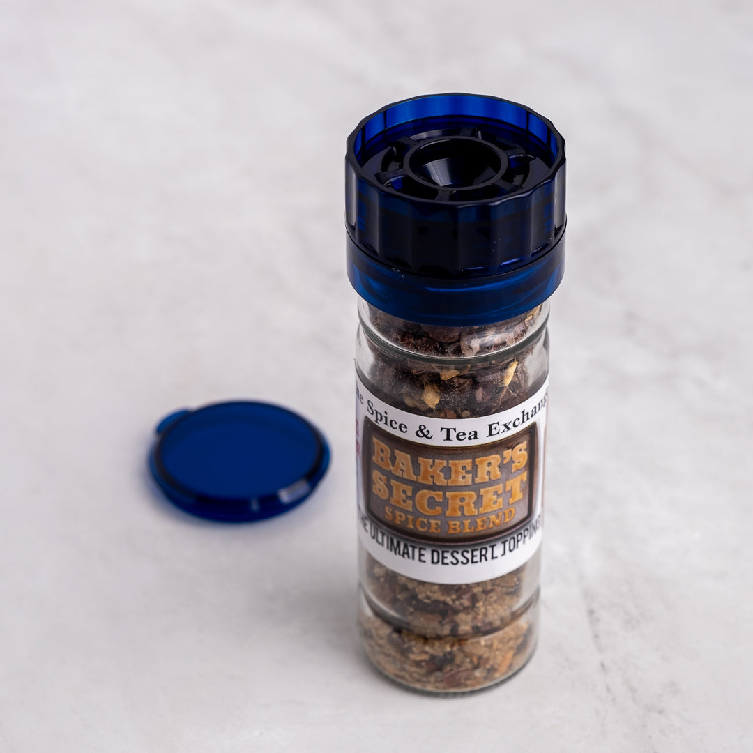 Spice grinder with 'Baker's Secret' label on a white background