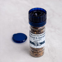 Spice grinder with 'Baker's Secret' label on a white background