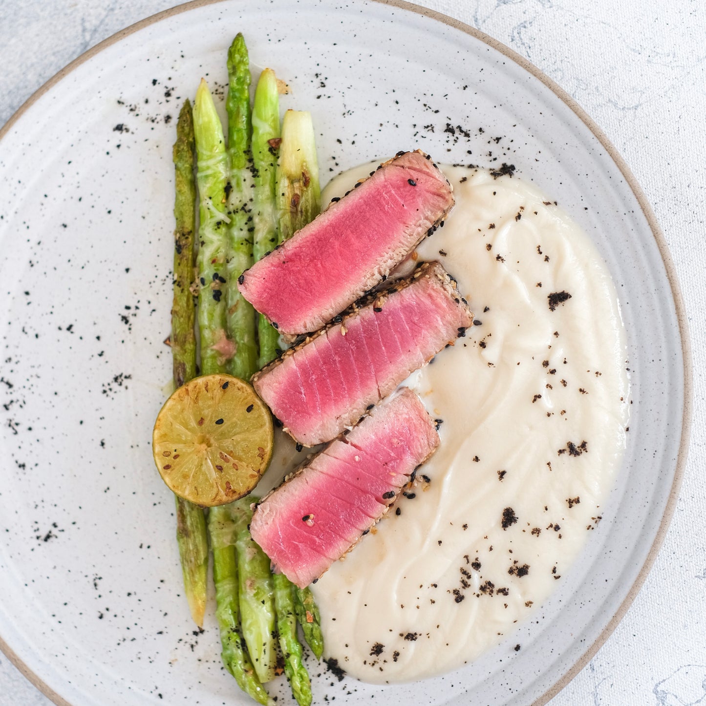 Black Lava Sea Salt on asparagus and tuna slices