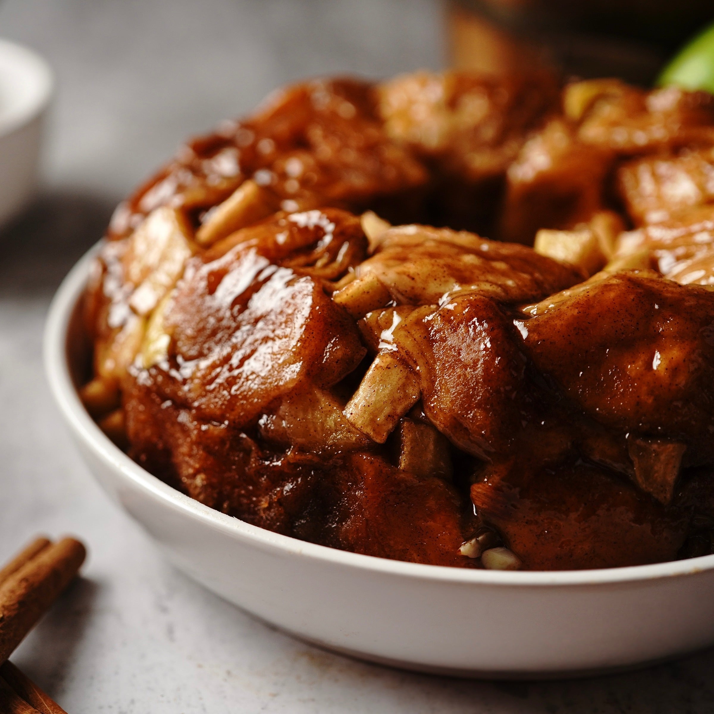 Caramel Apple Monkey Bread in large white bowl