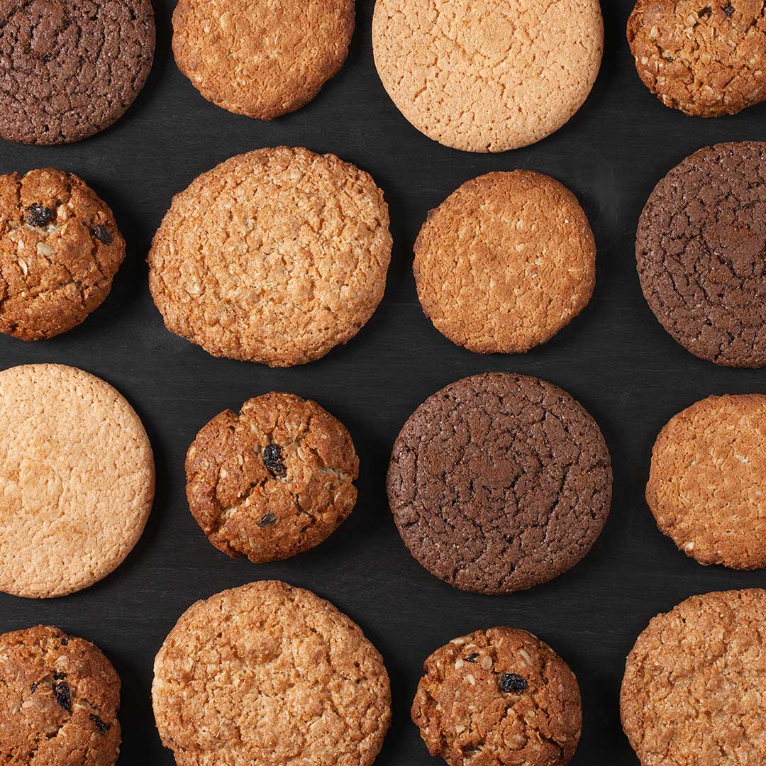 Assorted cookies on a dark surface