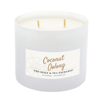A white two-wick candle in a frosted glass jar with a white label reading 'Coconut Oolong' and 'The Spice & Tea Exchange' on a plain white background.