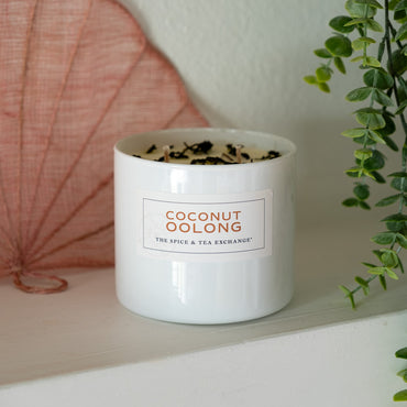 Coconut Oolong Candle on shell background