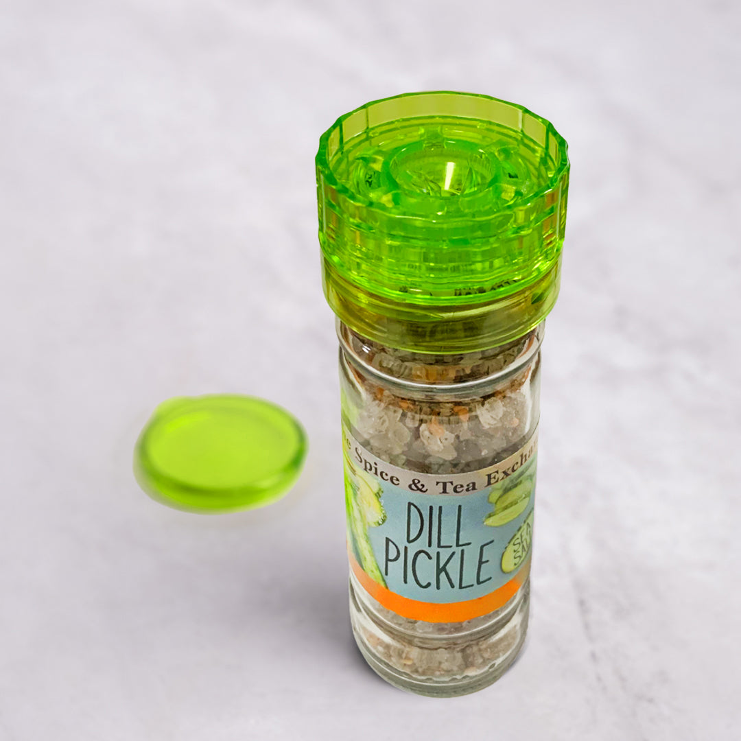 Dill Pickle Sea Salt Seasoning next to lid