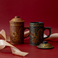 Dragon Tea Mug Infusers on red background with pink ribbons