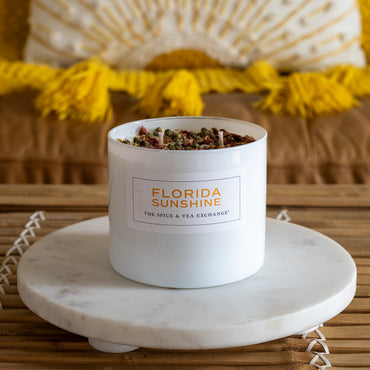 Florida Sunshine Candle on white tray with yellow and brown background
