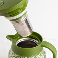 Green Hot Tea Steeper with tea infuser going in and out