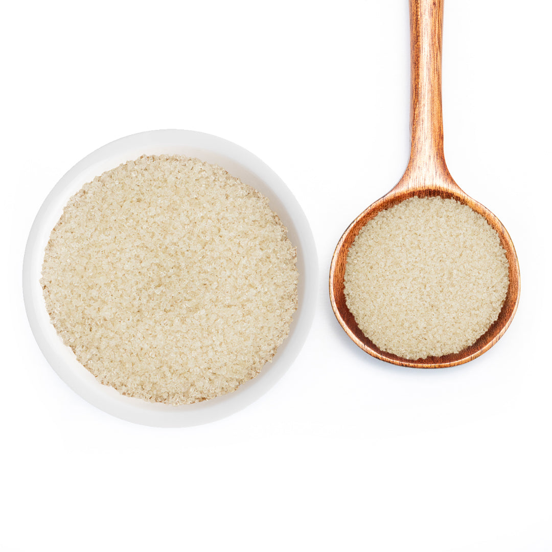 Lavender Sugar in white bowl and spoon