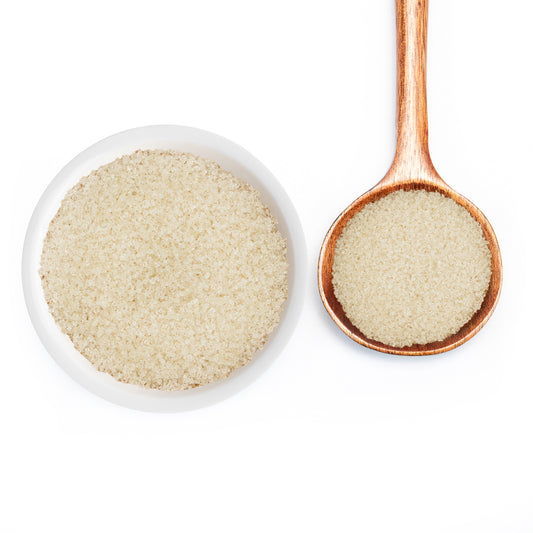 Lavender Sugar in white bowl and spoon