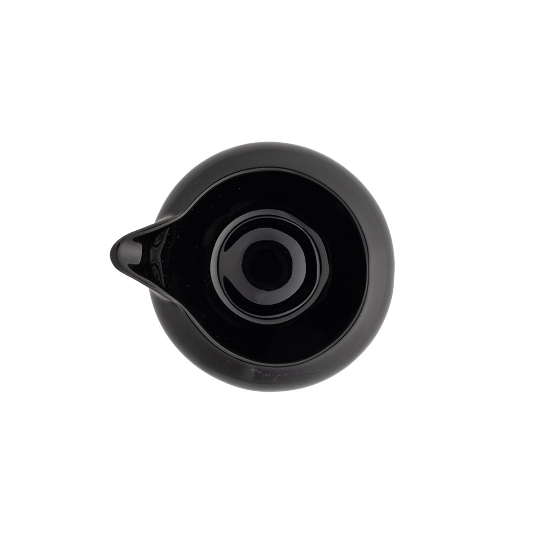 Black ceramic teapot on a white background