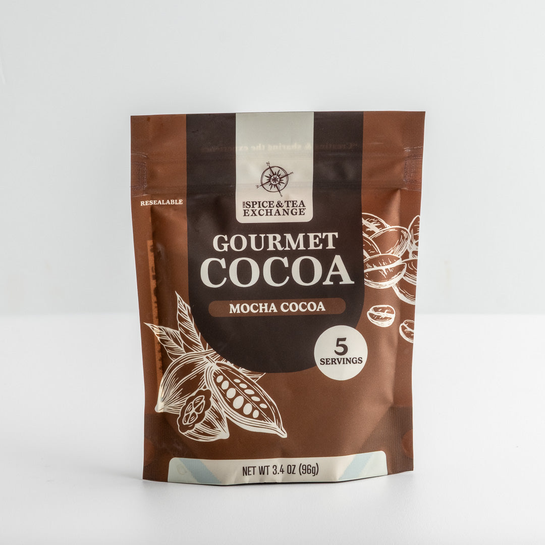 A stand-up pouch of Spice & Tea Exchange Gourmet Cocoa Mocha Cocoa, 3.4 oz (95g), on a light gray background.
