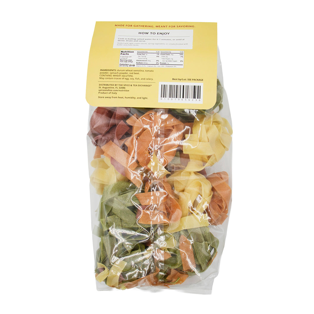 Packaged Pappardelle Primavera pasta with a yellow label on a white background - back side