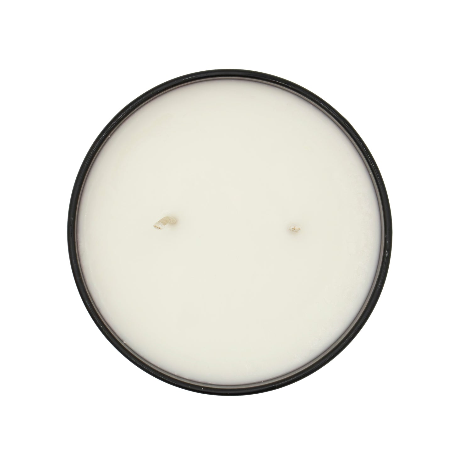 Round candle with a black lid on a white background