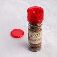 Pirate's Bite Spice Blend next to lid