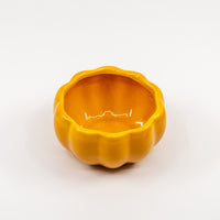 Orange pumpkin bowl.