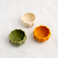 White, orange, and green pumpkin bowls.