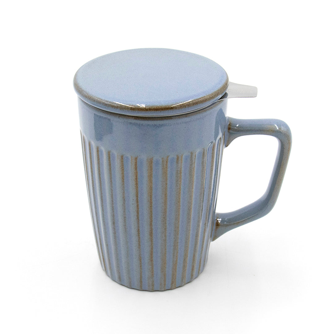 Blue ceramic mug with a lid on a white background