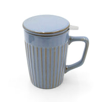 Blue ceramic mug with a lid on a white background