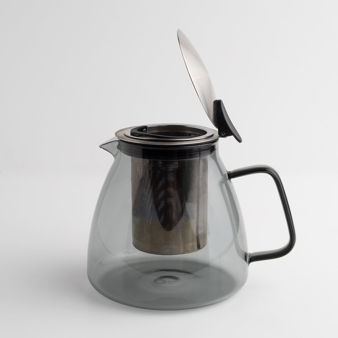Stormy Glass Teapot with black handle and lid on a white background