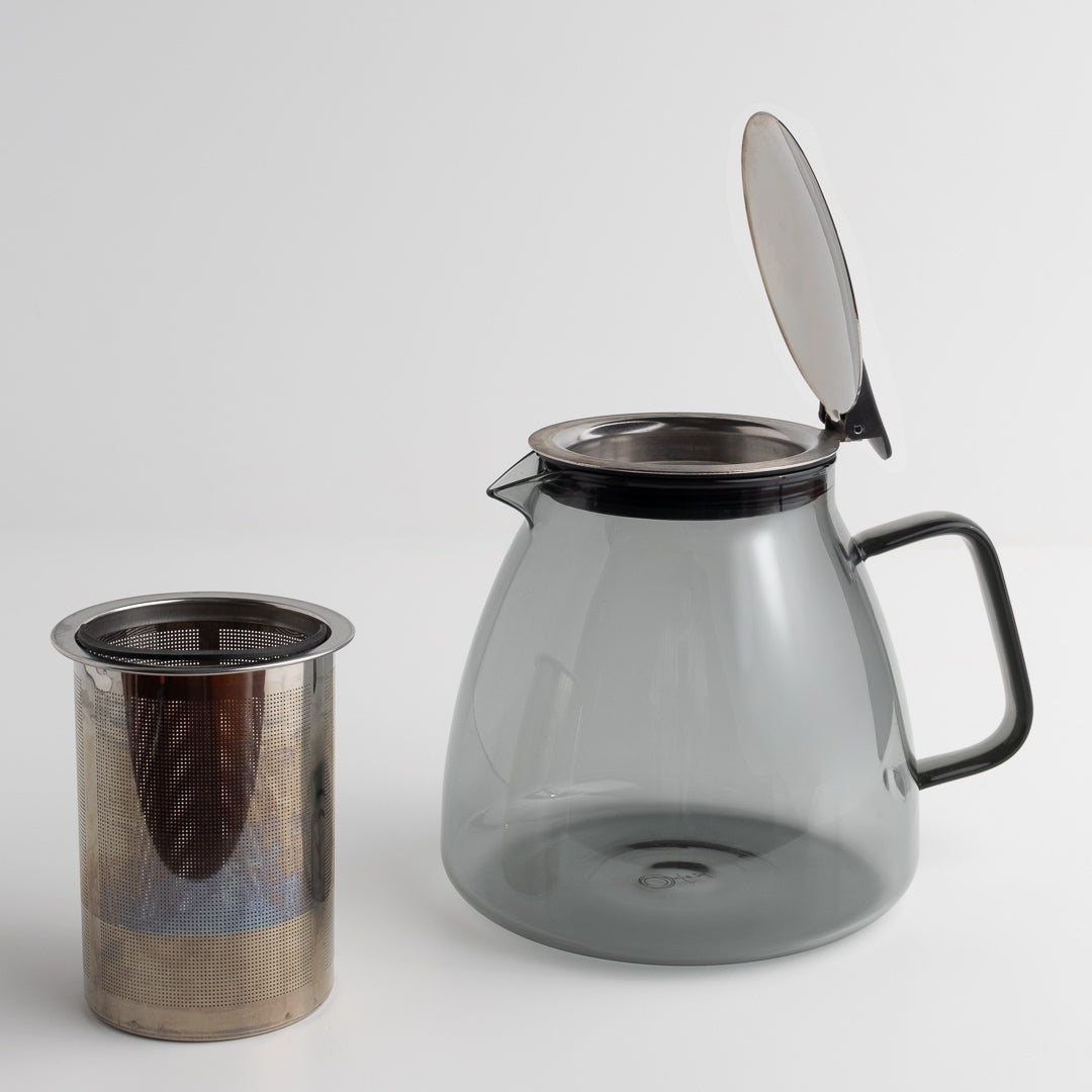 Stormy Glass Teapot with a metal filter on a white background