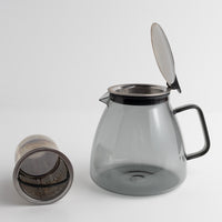 Stormy Glass Teapot with metal filter on a white background