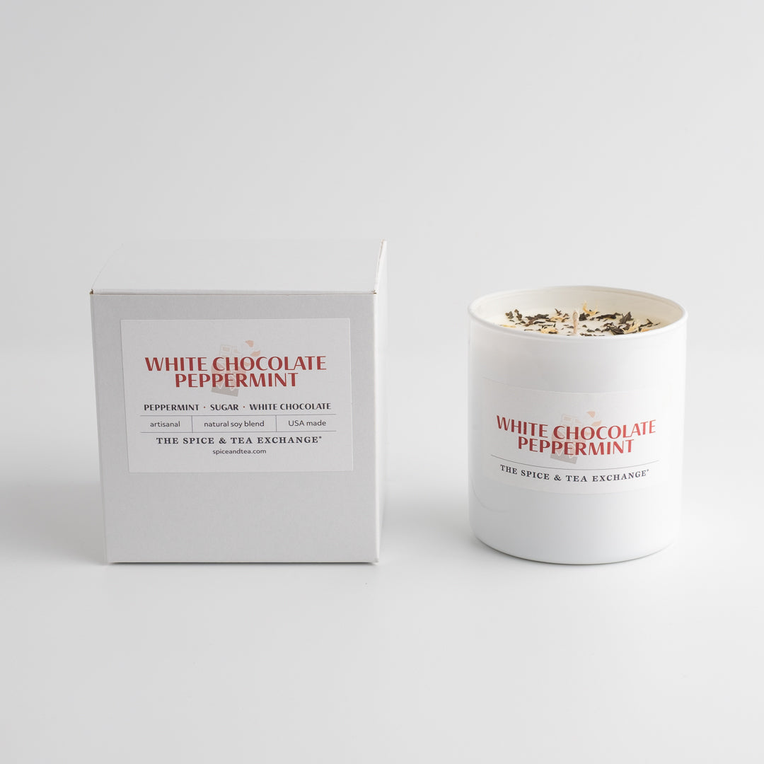 White chocolate peppermint candle and packaging on a white background