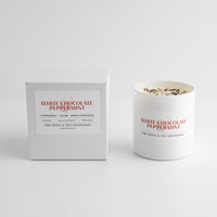 White chocolate peppermint candle and packaging on a white background