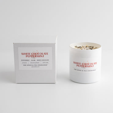 White chocolate peppermint candle and packaging on a white background