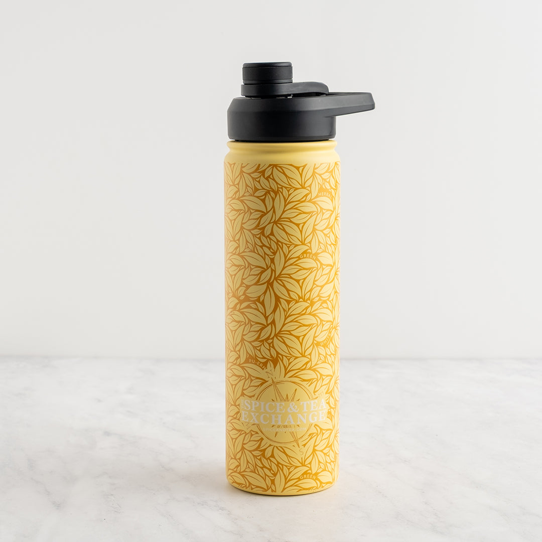 Yellow water bottle with black lid on a white background